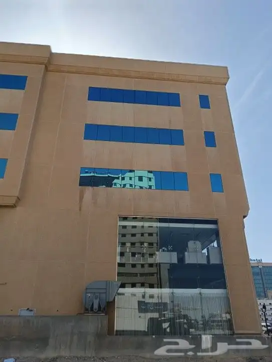 خدمات تنظيف واجهات زجاجيه وكلادنك 0