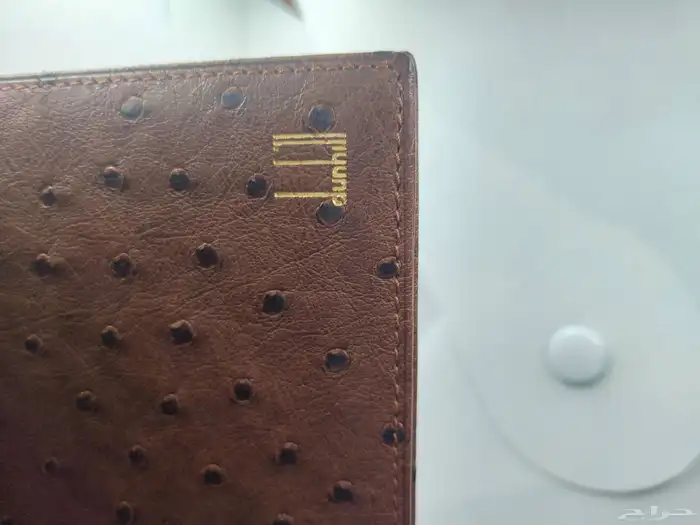 تصفية قطعتين دنهل محفظة جلد نعام ومضرب قولف دنهل اصلي فنتج 7