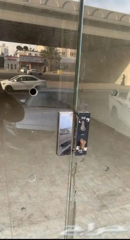 صيانة أبواب الزجاج والسيكوريت 6