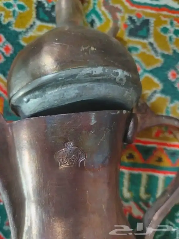 دلال قديمه وحده عليها ختمين وحده عليها ختم واحد 15