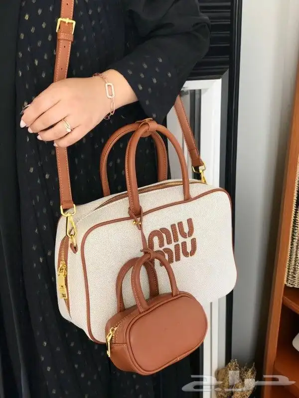 شنط ميو ميو مع محافظة صغيره 5