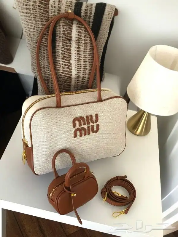 شنط ميو ميو مع محافظة صغيره 7