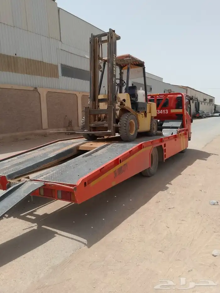 Forklift rental  download and upload trailer Al-Muzahmiya 1