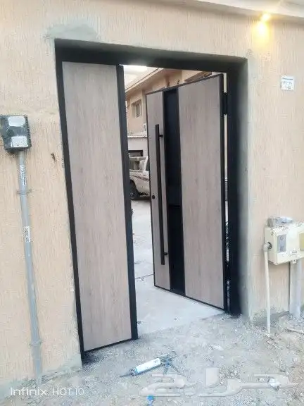 ابواب حديد ابواب المينوم شبابيك مظلات سواتر 1