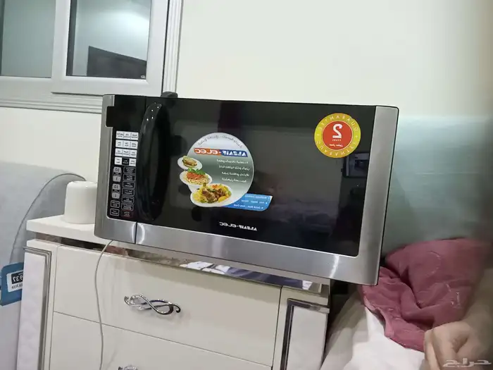 ميكروويف جديد بحاله الزيرو البيع لعدم الحاجه 0