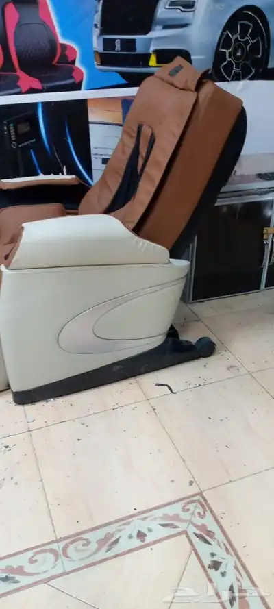 تنجيد كرسي مساج من اللون الاسود الى لونين جلد اصلي 2