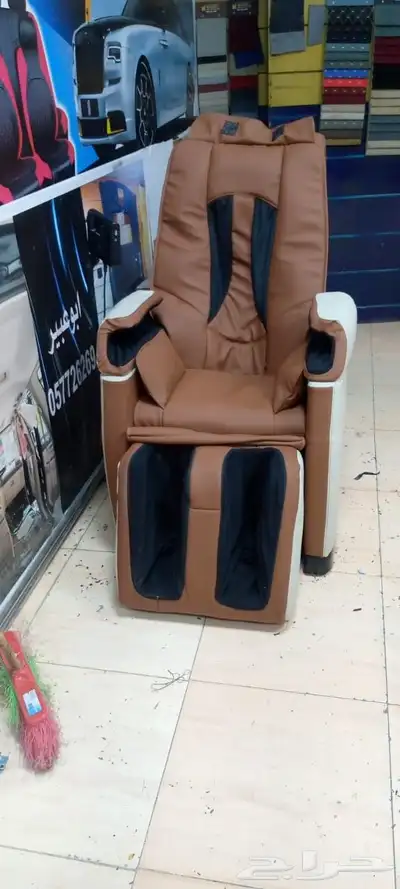 تنجيد كرسي مساج من اللون الاسود الى لونين جلد اصلي 0