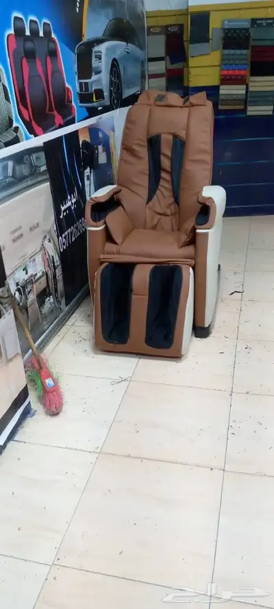 تنجيد كرسي مساج من اللون الاسود الى لونين جلد اصلي 1