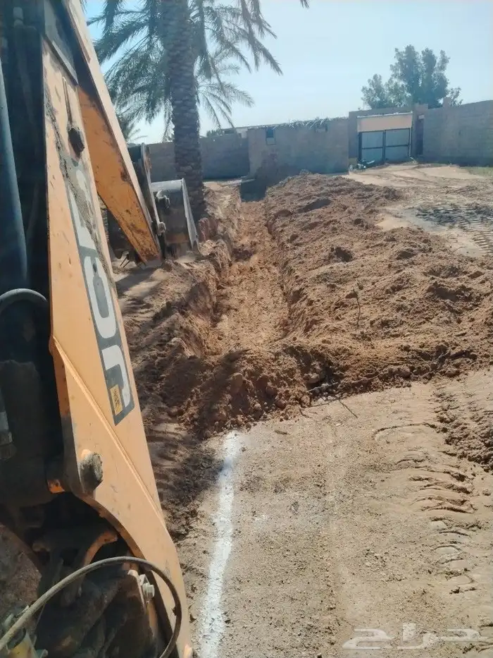 يوجد لدينا بوكلين وجسي بي حفر نخل او قلع نخل 0