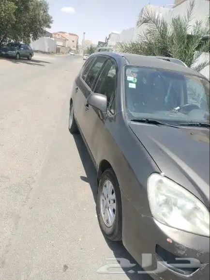 سياره كيا كارينز 2012 الممشي 225 عدد الركاب 7 4