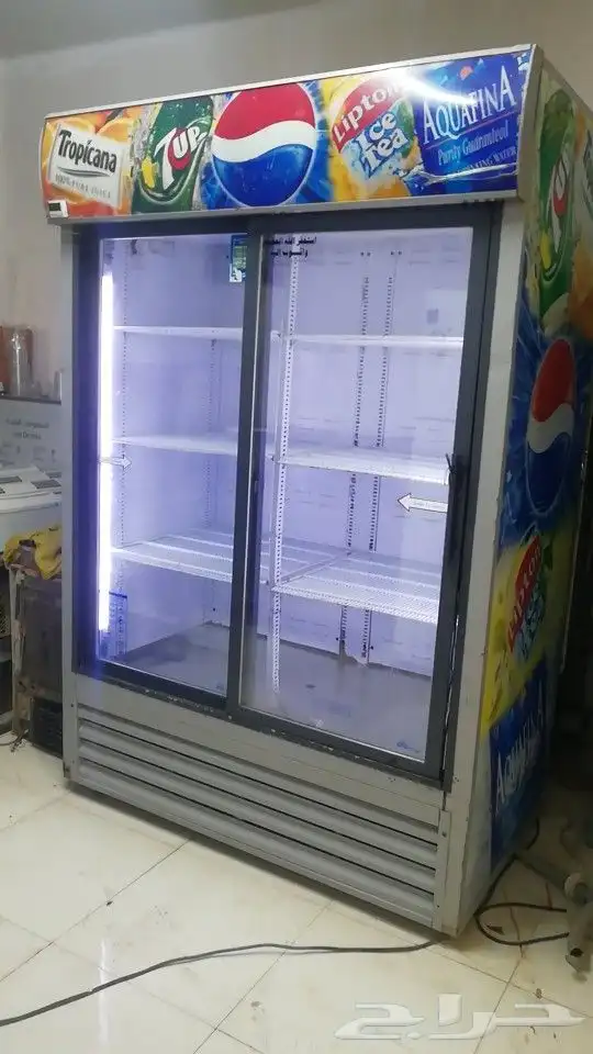 ثلاجه بيبسي بابين الحجم الكبير مستخدمه شبه جديد وكاله 8