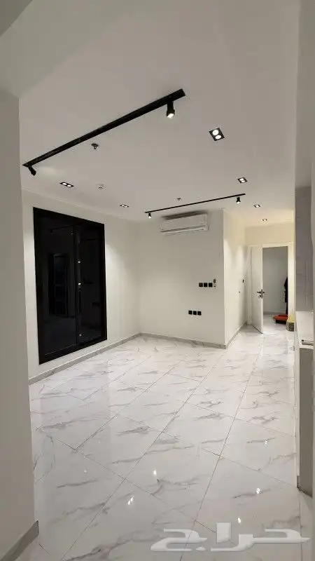 شقه للايجار حي اليرموك في عماره الايجار السنوي 60الف 4