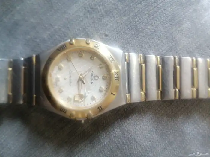 ساعة ؤميقا مطلية بالذهب 0