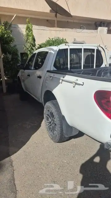 مستبيشي L200 2014 دبل 1