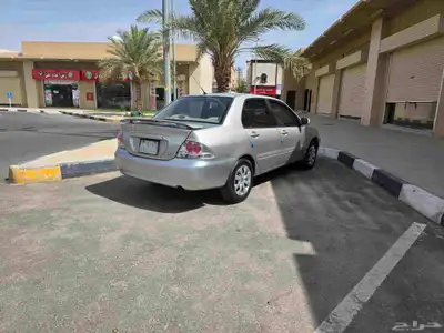 سيارة لانسر ميتسوبيشي موديل 2009 نظيف 0