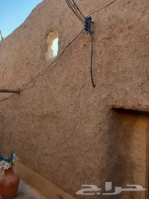 ابو ناصر التراث بنيان طين وسقوف وتليوس طين وبنيان حجر 4