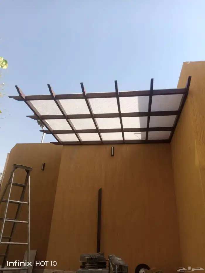 ابواب حديد ابواب المينوم شبابيك مظلات سواتر 5