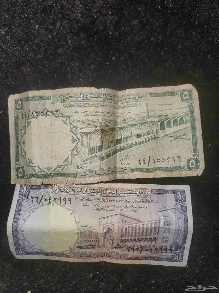 عملات من عهد الملك فيصل الله يرحمه . 0
