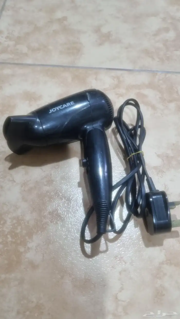 سشوار ومكوه شعر ومضرب ناموس معاه حامل ثابت 3