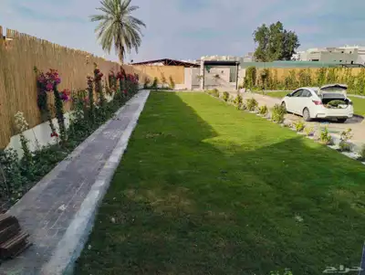 تنسيق حدائق جازان جلسات خارجيه أحواض زراع عشب صناعي بديل خشب 8