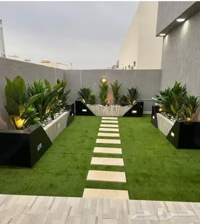 تنسيق حدائق جازان جلسات خارجيه أحواض زراع عشب صناعي بديل خشب 13