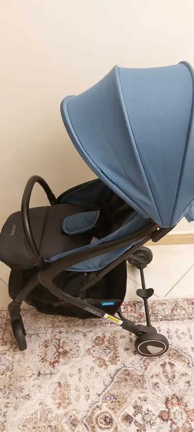 عربية اطفال مع كرسي اطفال مخصص للسيارة 1