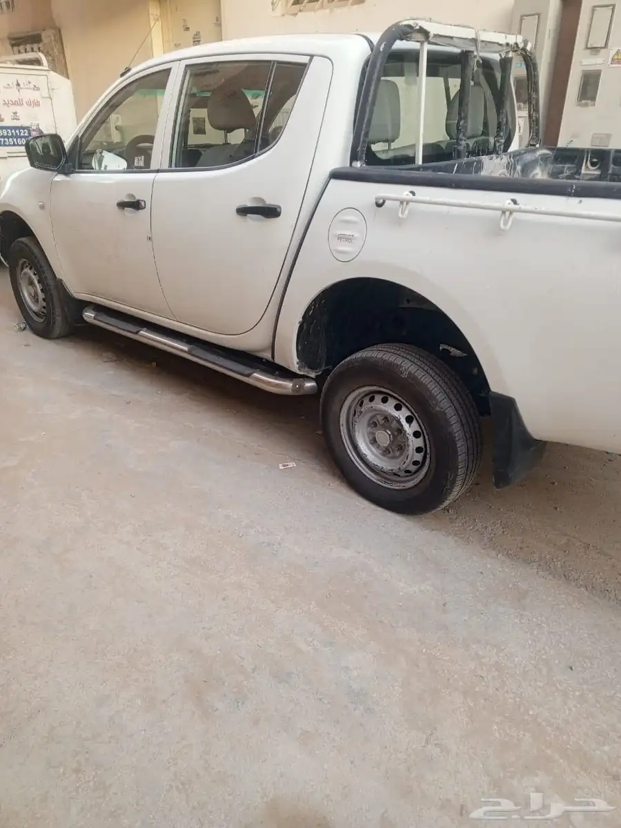 سيارة متسوبيشي دبل موديل 2014 ممشي 290 الف 1