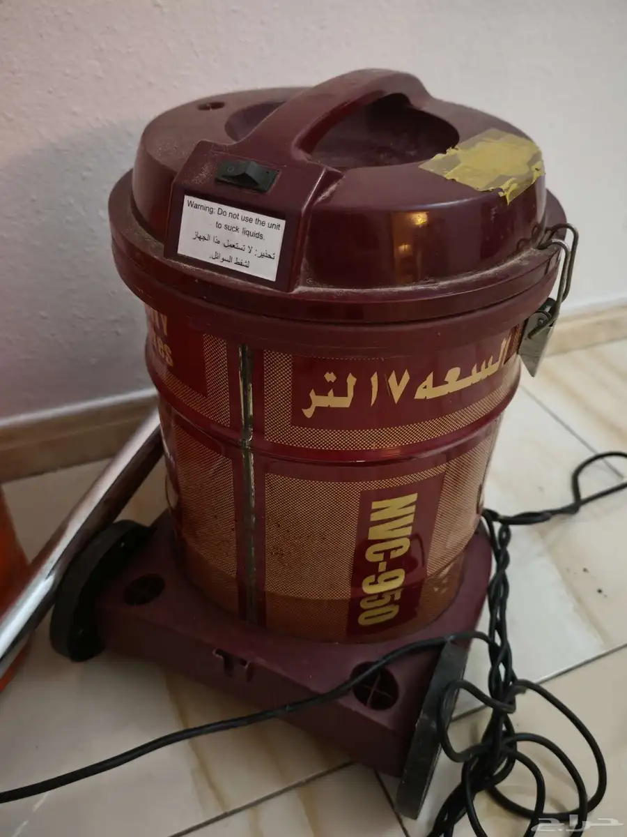 انبوبة مع المنظم و مكنسة كهربائية 1