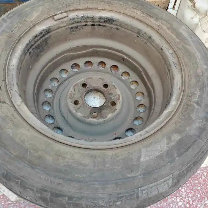 جنط مع كفر اكورد 2003 مقاسه 15انش وعفريتة 1