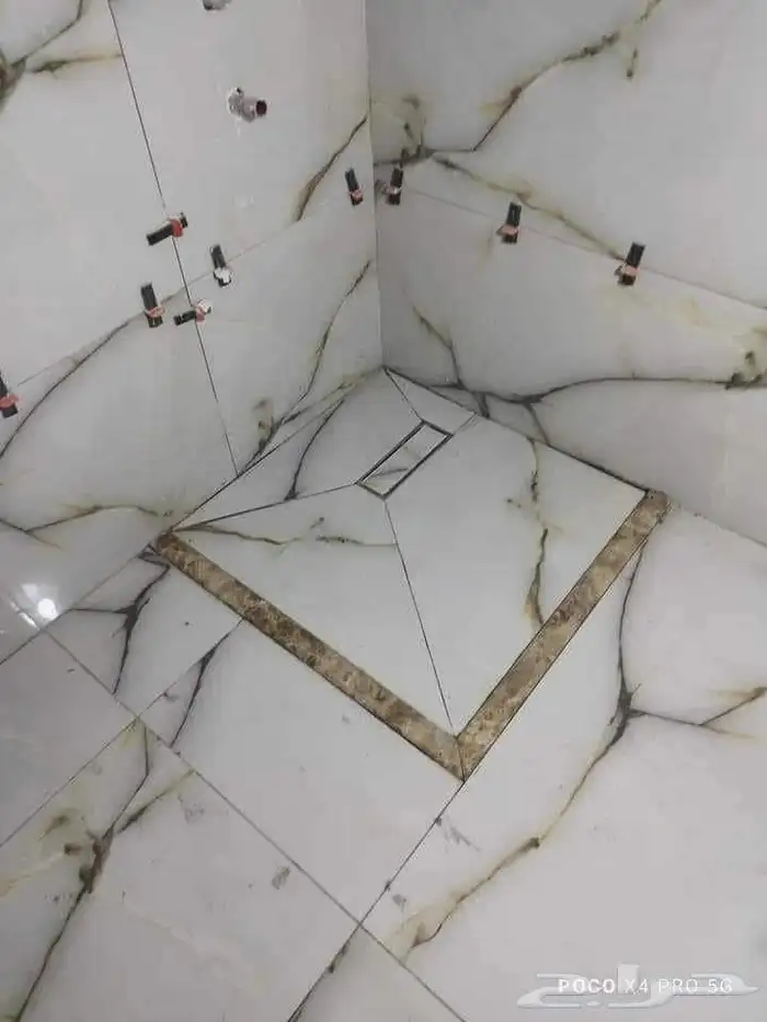 معلم بلاط جميع انواع البلط سرميك ورخام وجدران و ارضيات ودرج 2