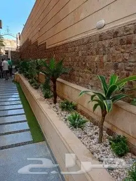 تنسيق حدائق وثيل طبيعي 3