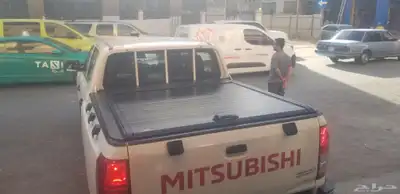 غطاء حوض سحاب مستبوشي L200 2024 1