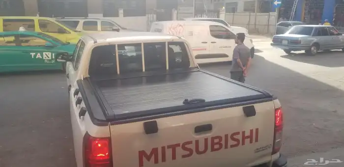 غطاء حوض سحاب مستبوشي L200 2024 1