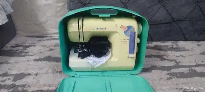 مكينة خياطة و تطريز انفنتي 0