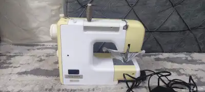 مكينة خياطة و تطريز انفنتي 5