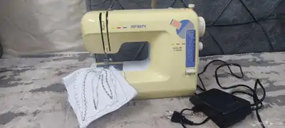 مكينة خياطة و تطريز انفنتي 6