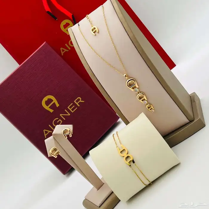 طقم اكسسوارات سلسال مع الحلق مع اسواره من ماركة اقنر مع الم 1