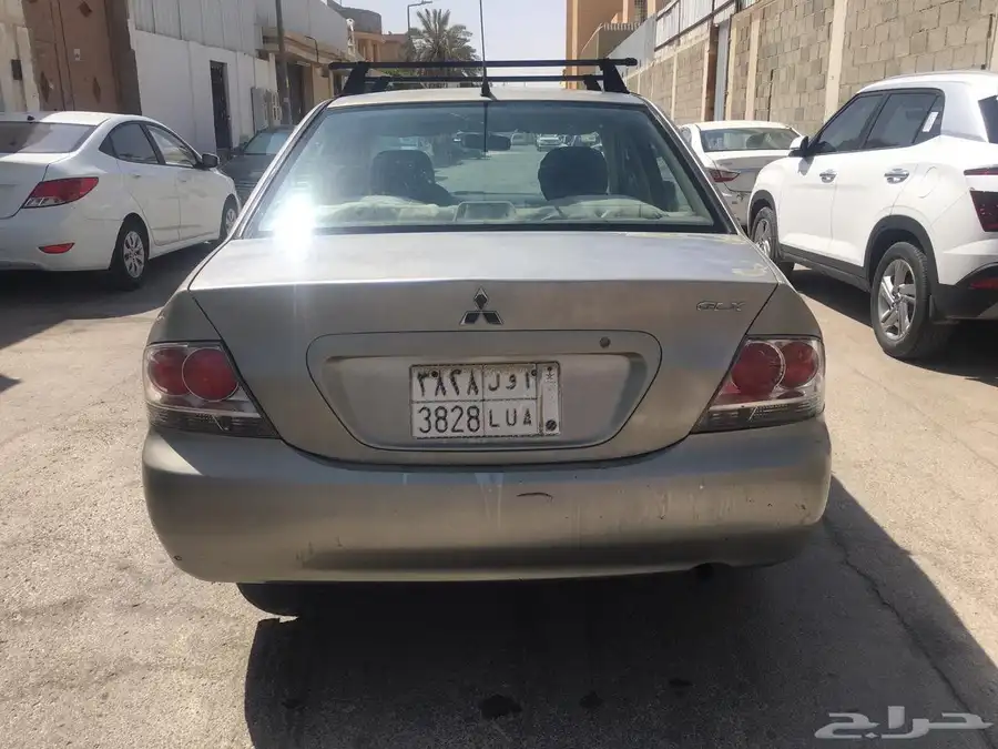 للبيع سياره لانسر 2009 3