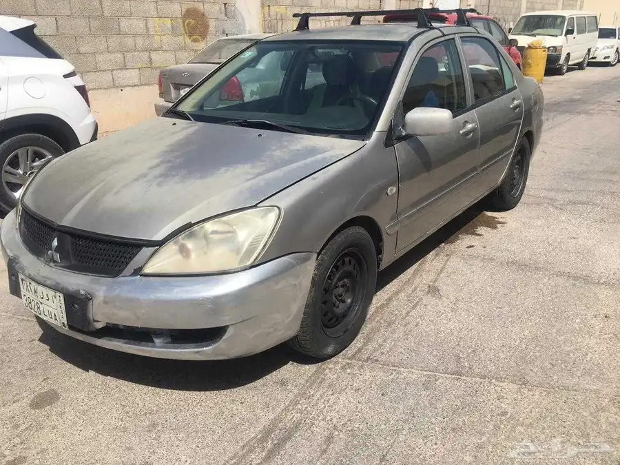 للبيع سياره لانسر 2009 4