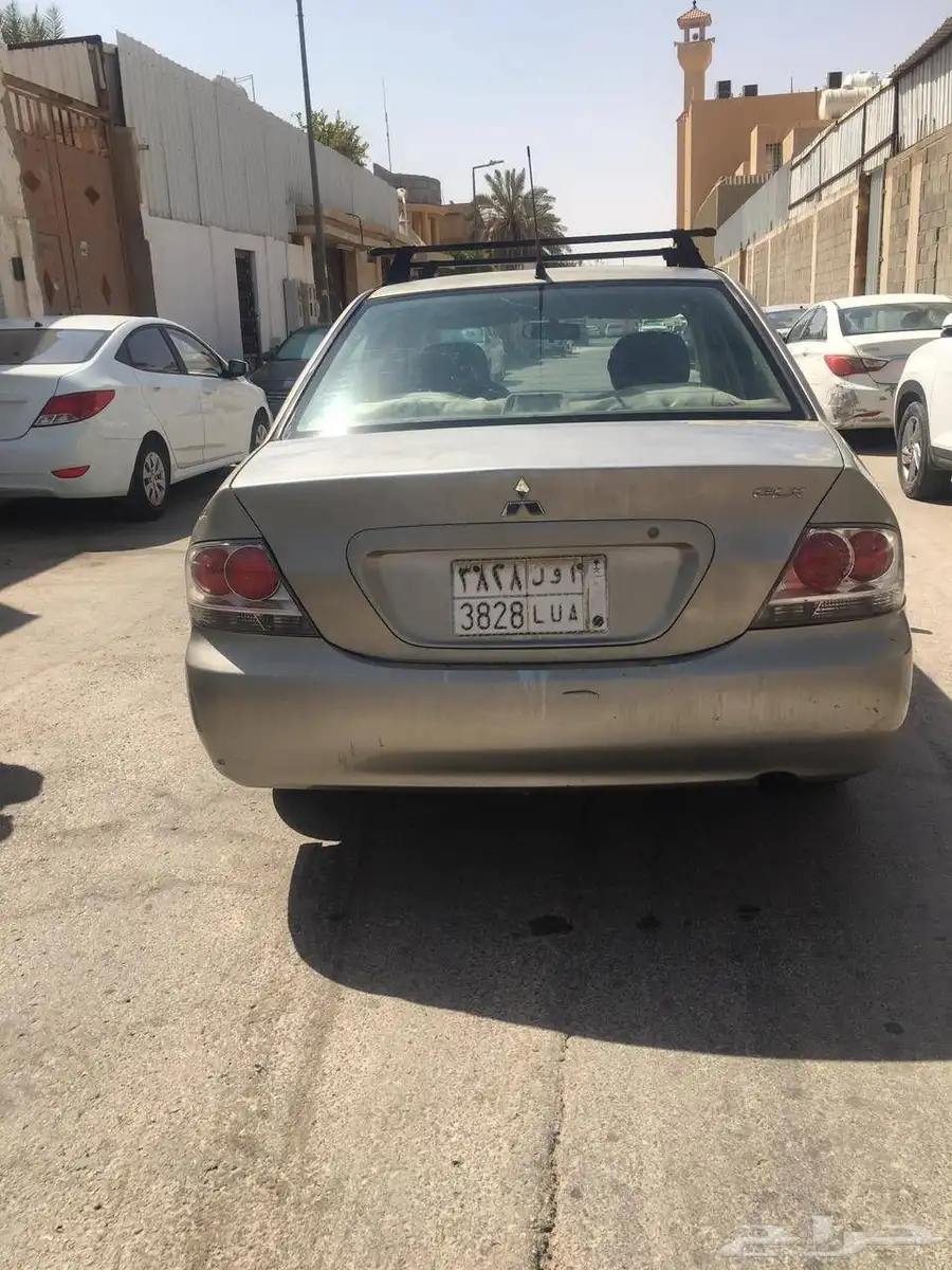 للبيع سياره لانسر 2009 0