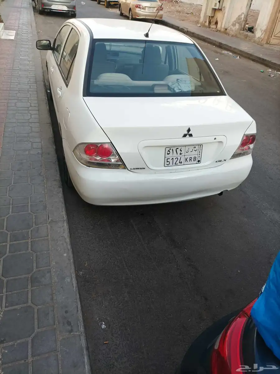 سياره ميتسوبيشي لانسر 2010 13