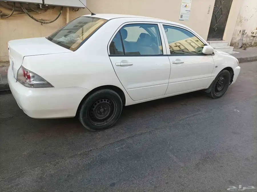 سياره ميتسوبيشي لانسر 2010 14