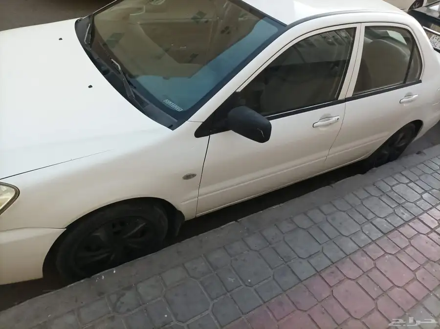سياره ميتسوبيشي لانسر 2010 8