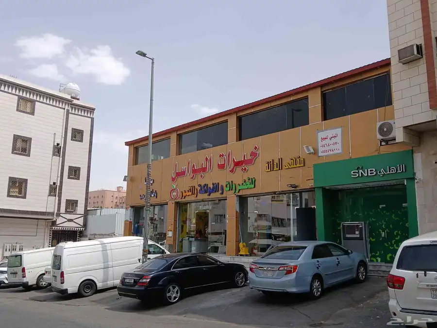 للبيع مبنى تجاري مكون من 5 محلات الدخل 142.000الف 11