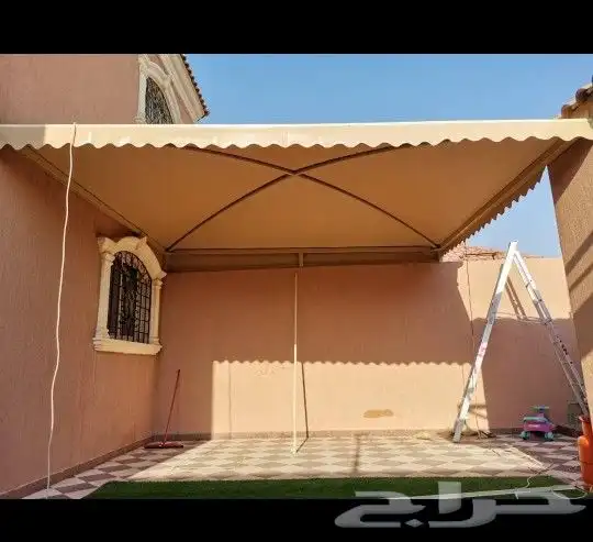 تركيب مظلات وسواتر برجولات هناجر سندويتش بنل المزاحمية 4