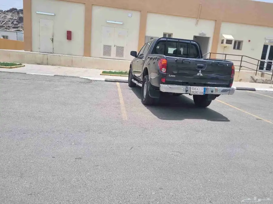 متسوبيشي وانيت دبل بنزين l200 4