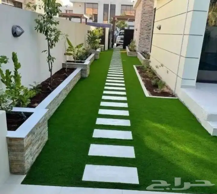 تركيب العشب الطبيعي والصناعي 2