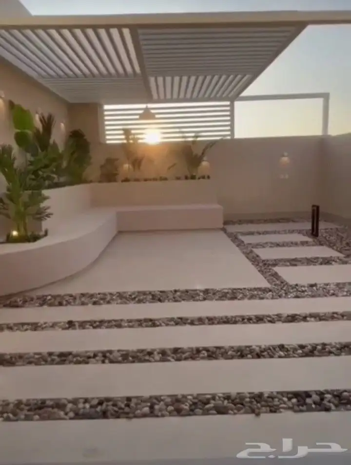 تركيب العشب الطبيعي والصناعي 6