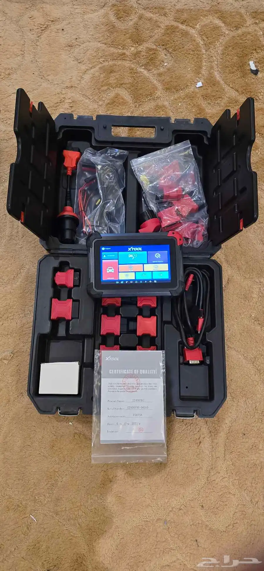 جهاز فحص جميع انواع السيارات مع برمجة المفاتيح . xtool 0