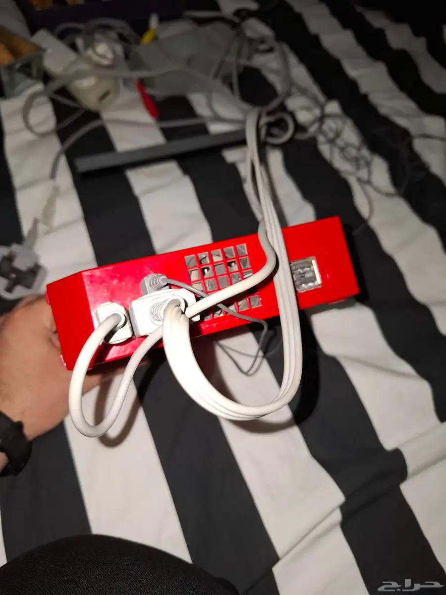 Used red Wii for sale (motion sensor  cables  controller) 3